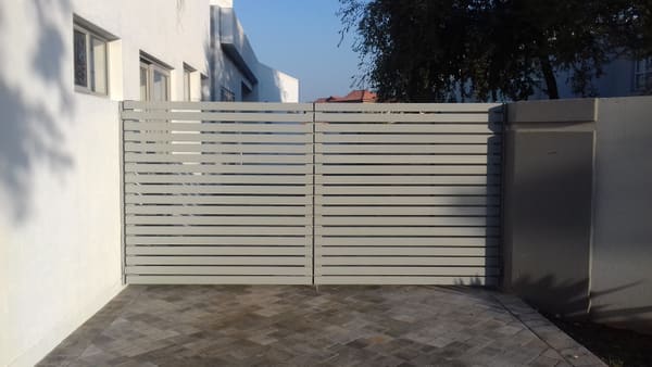 A dove grey steel gate