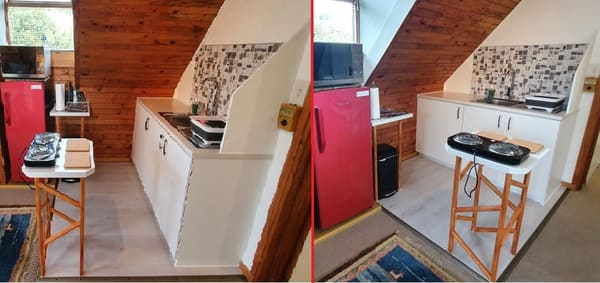 A kitchenette with tiling and a laminated floor